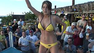 College students strip for a daytime competition in South Padre Island