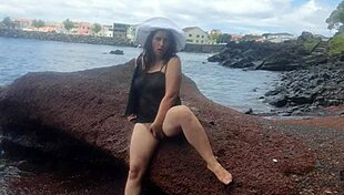 The seductive stepmom lures on a public beach