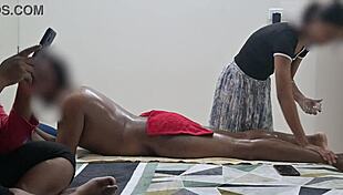 I watch two girls give handjob and massage in spa.