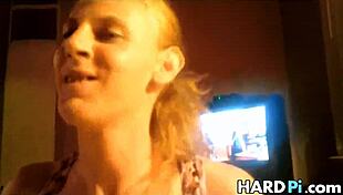 Busty wife strokes husband's cock in homemade video with big tits on display.