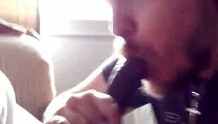 This guy eagerly sucks on a massive black cock in a casual encounter.