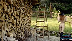 Tiny redhead teen model strips naked outdoors chopping wood