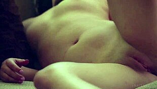 delphine fingers her wet pussy intensely on the sofa!