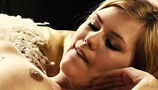 delphine fingers her wet pussy intensely on the sofa!