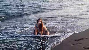 Horny teen flaunts big ass on beach 😏