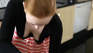 Redhead searches for keys, revealing downblouse view in kitchen