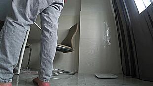 Cheating wife fucks friend in kitchen while husband works.