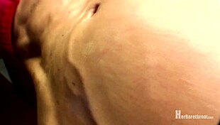 Muscular bodybuilder dances in bikini and thong