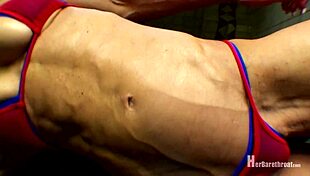 Muscular bodybuilder dances in bikini and thong