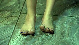 hey, check out this foot fetish babe walking naked barefoot with blue nails on her soles, bugs bunny style
