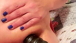 Feeling the intense pleasure as the ass plug stretches for gaping