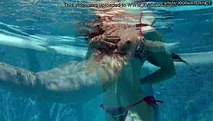 Nicole Pearl super hot and horny shaking ass in the pool with small tits