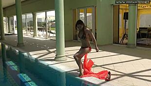 Nicole Pearl super hot and horny shaking ass in the pool with small tits