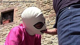 laura gives outdoor blowjob in pink outfit on heels with monster cock