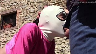 laura gives outdoor blowjob in pink outfit on heels with monster cock