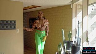 Ebony model Nyla rips clothes to show huge natural tits