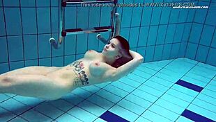 European beauty Dashka goes topless in the pool
