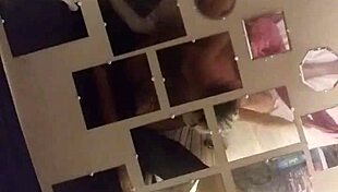 Husband and wife engage in homemade love making.