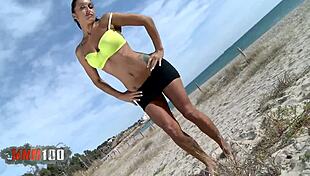 Horny milf Coral Joice feels excited stripping her big boobs on the beach, inviting you to watch