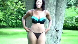 voluptuous beauty bounces around the room