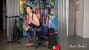 Busty mature icon Josephine James in a steamy gym workout - AuntJudys