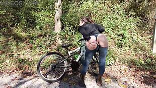 Exhibitionist In Butt-Less Jeans Teasing On Bike Trail