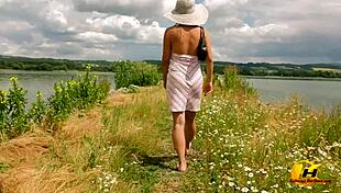 Blonde masturbates outdoors on sunny lake!