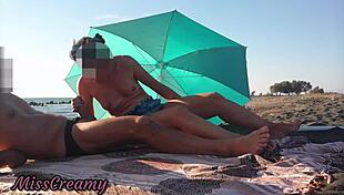 Flashing my cock boldly at a crowded public beach