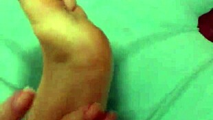 sexy latina woman exhibits her feet in a solo fetish display