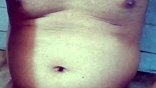 Indian gay bottom takes own golden shower intensely