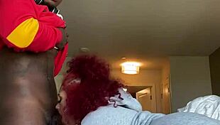 Fat redhead lady sucks big black cock from POV.