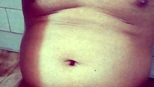 Indian gay bottom takes own golden shower intensely