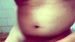 Indian gay bottom takes own golden shower intensely