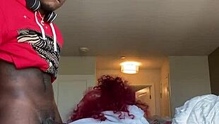 Fat redhead lady sucks big black cock from POV.