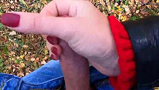 Cute teen caught in nature for a steamy public handjob