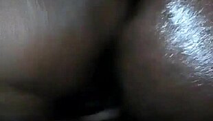 Rubbing Body Oil On A Black Milf