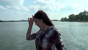 Czech redhead beauty exposes her pussy on the beach.