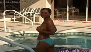 Big tits by the pool in a bikini, teasing the model