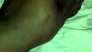 Rubbing Body Oil On A Black Milf