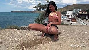 Teen 18+ pees publicly naked on beach with people watching!