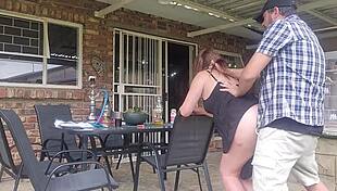 Neighbor's wife gets intense outdoor fuck while husband works