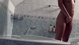sexy babe camilla moon fingers pussy in bathroom