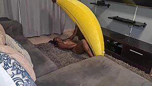 A tattooed Indian woman has sex with a big banana in this homemade video