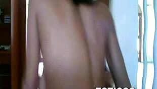On Toticos.com, this fine-ass Dominican girl with glasses strips naked during her live webcam show