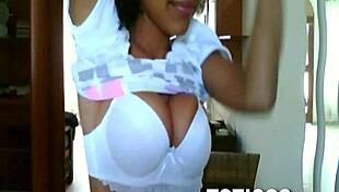 On Toticos.com, this fine-ass Dominican girl with glasses strips naked during her live webcam show