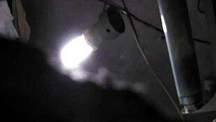 Young Asian mom with big boobs bathes in shower, showing tits.