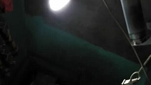 Young Asian mom with big boobs bathes in shower, showing tits.