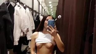 Beautiful woman enjoys intense orgasms in the fitting room