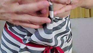 Married woman enjoys private solo time in apron