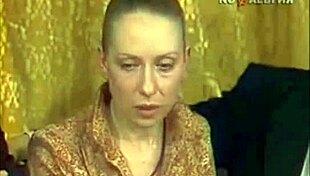 Is this crazy Russian MILF reading Pushkin with legs spread and tits exposed?